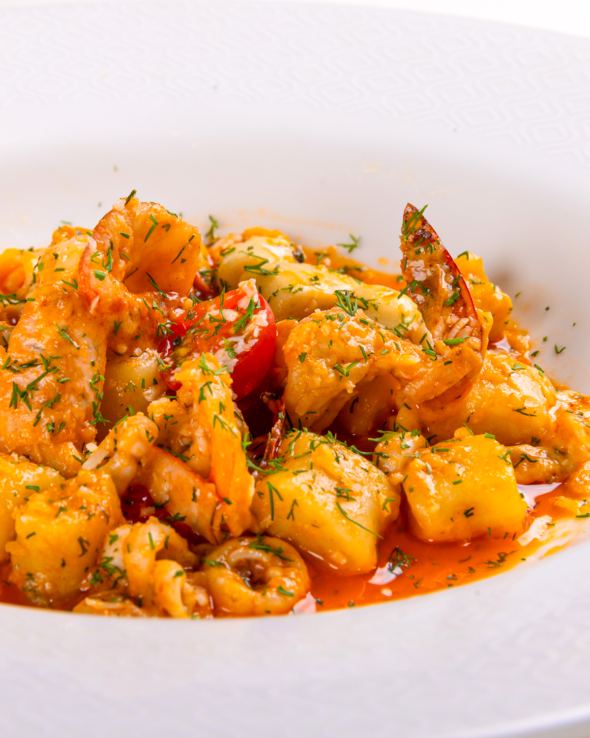 Gnocchi Conditi Con Gamberi, Calamari, Capesante E Burro All